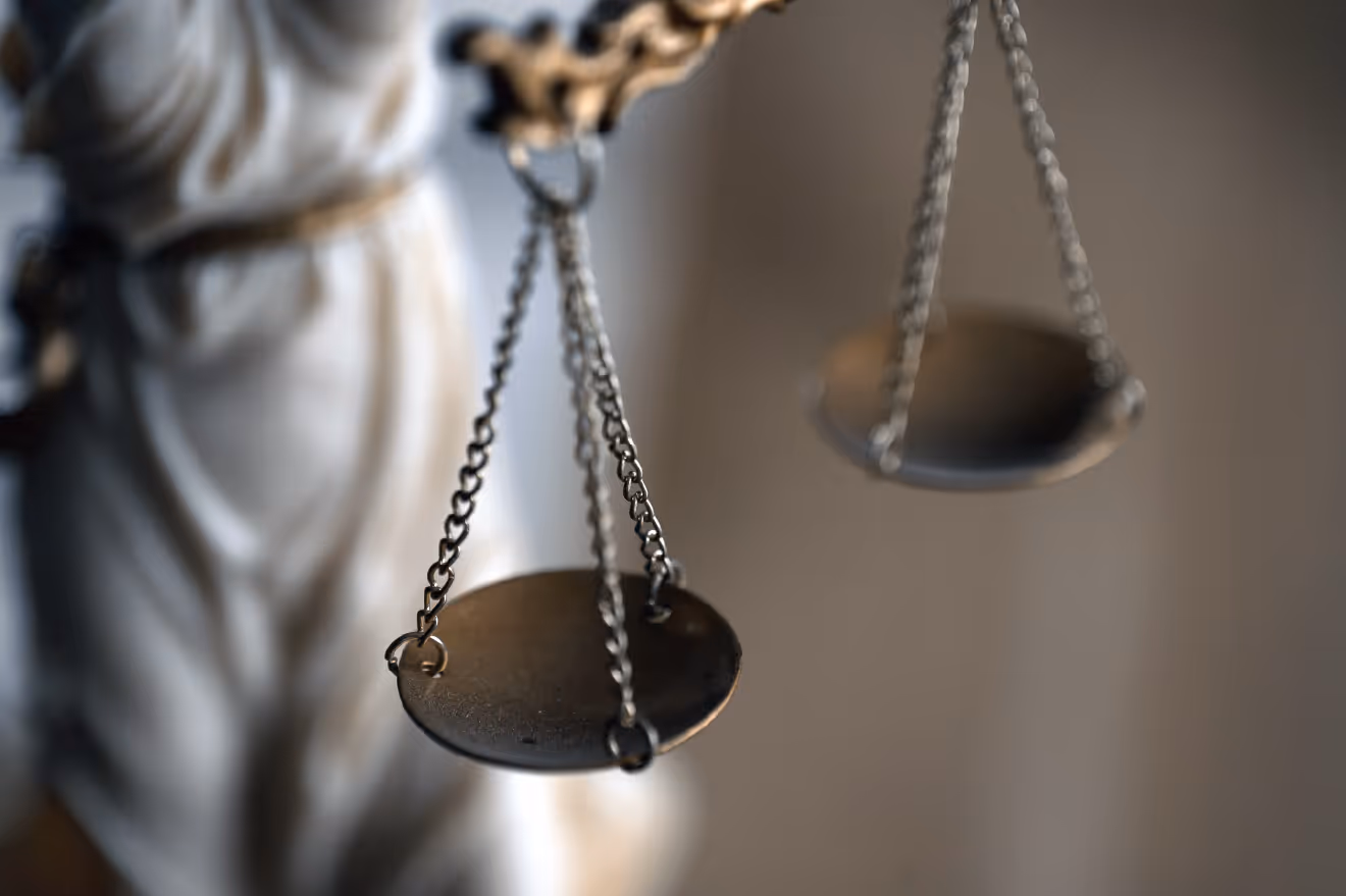 Symbolic balance scales representing justice and impartiality