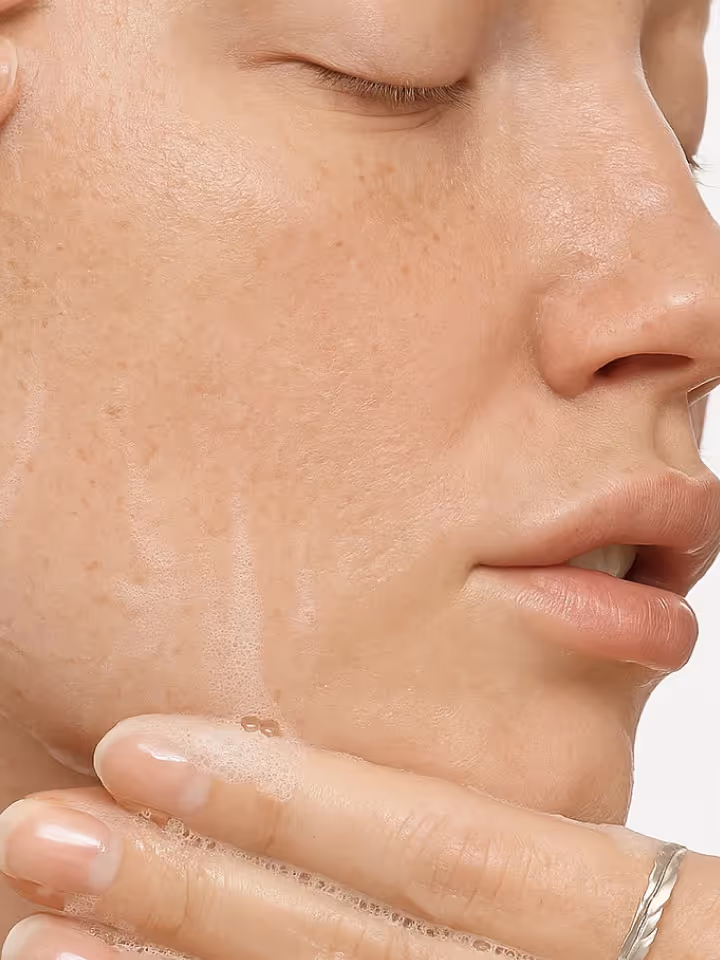 Close-up of a woman’s natural skin during a facial treatment at Natural Beauty by Helen, a beauty clinic in Twickenham, London.