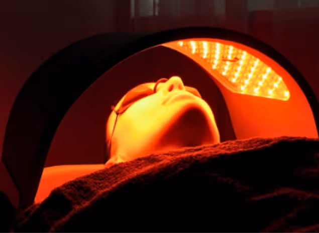 Relaxing beauty treatment at Natural Beauty by Helen, featuring skin rejuvenation under soothing LED lights in Twickenham.
