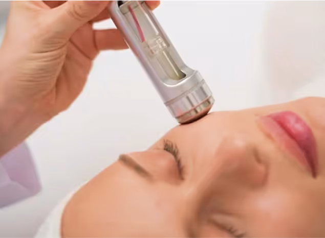 Personalized beauty treatment at Natural Beauty by Helen in Twickenham, featuring a facial procedure for glowing skin.