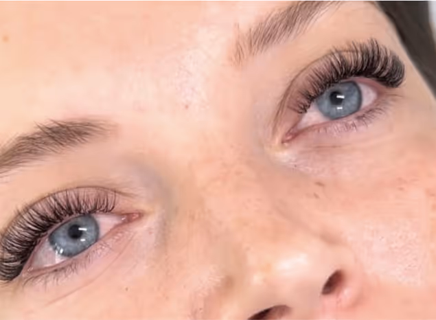 Beautiful close-up of eyes showcasing enhanced lashes, highlighting personalized beauty treatments at Natural Beauty by Helen, Twickenham.