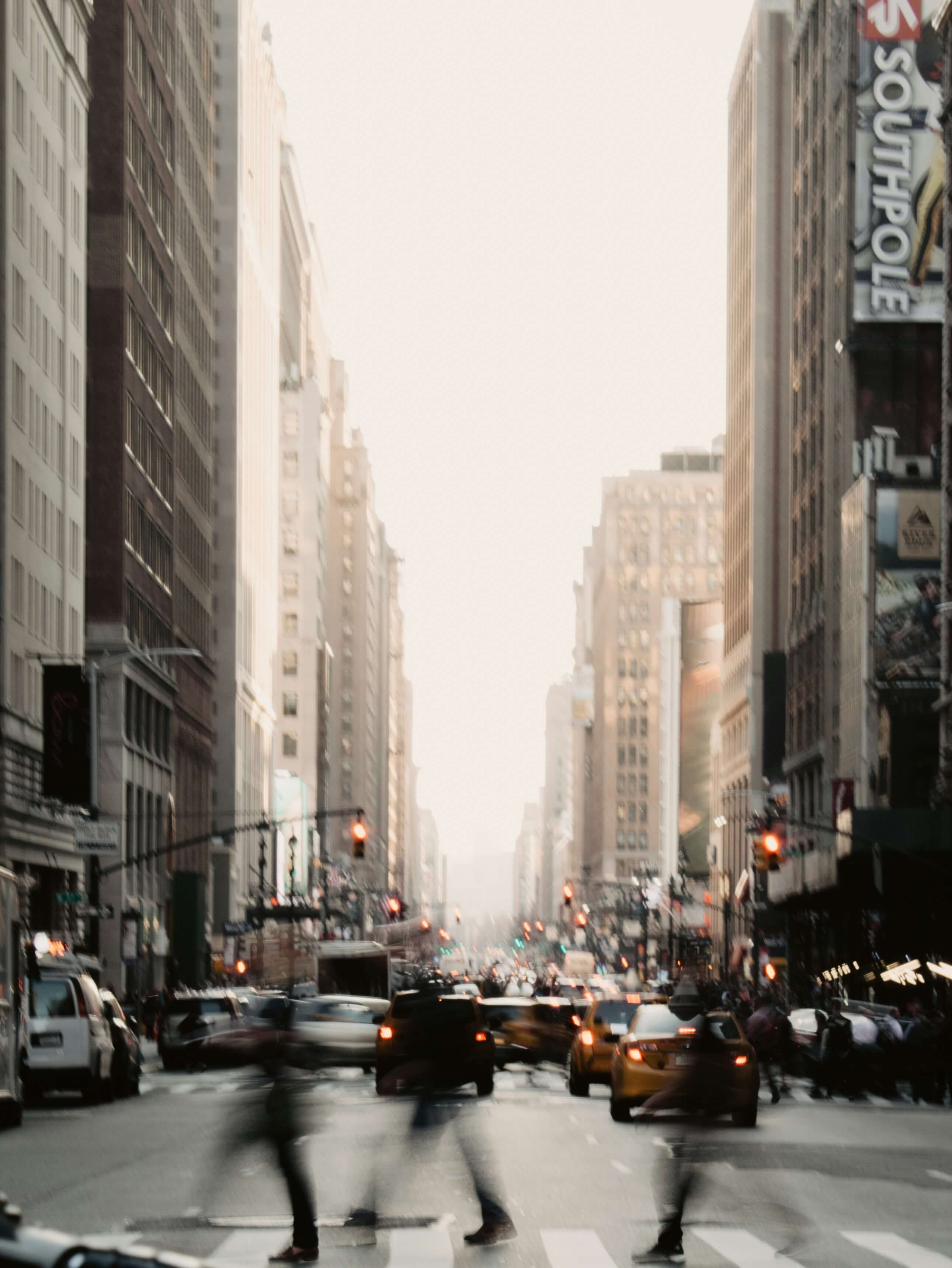 Busy city street with people walking
