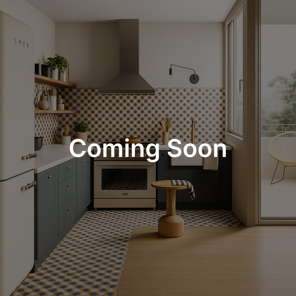 A retro-style kitchen with a blue and yellow tiled backsplash and floor, featuring a "SMEG" refrigerator and dark blue cabinets. The text "Coming Soon" is overlaid in large, white letters in the center of the image.
