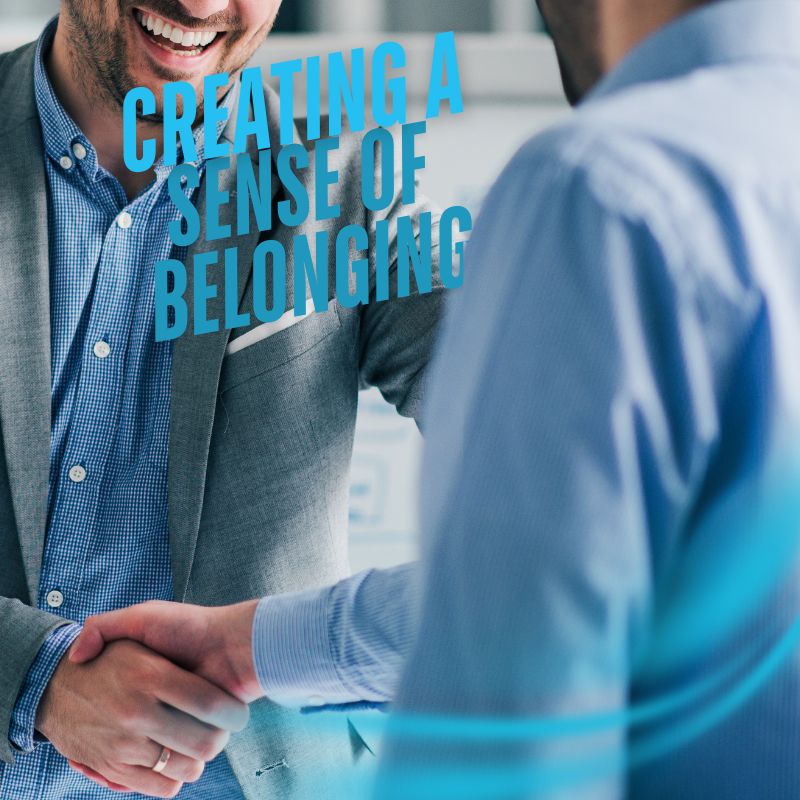 employer shaking hands of employee