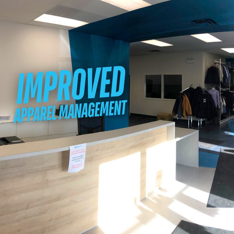 q custom clothing front desk area