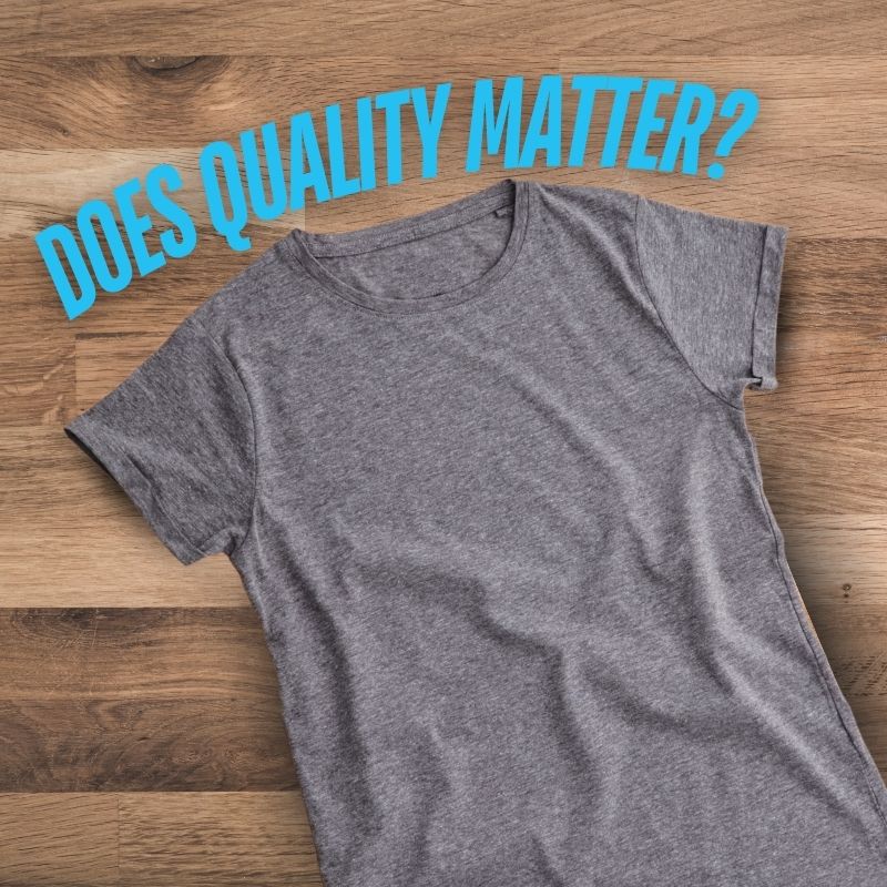 a grey shirt laid out