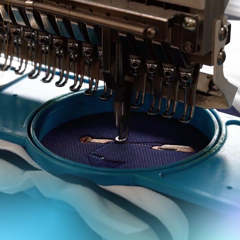 close-up image of a design being embroidered onto a garment