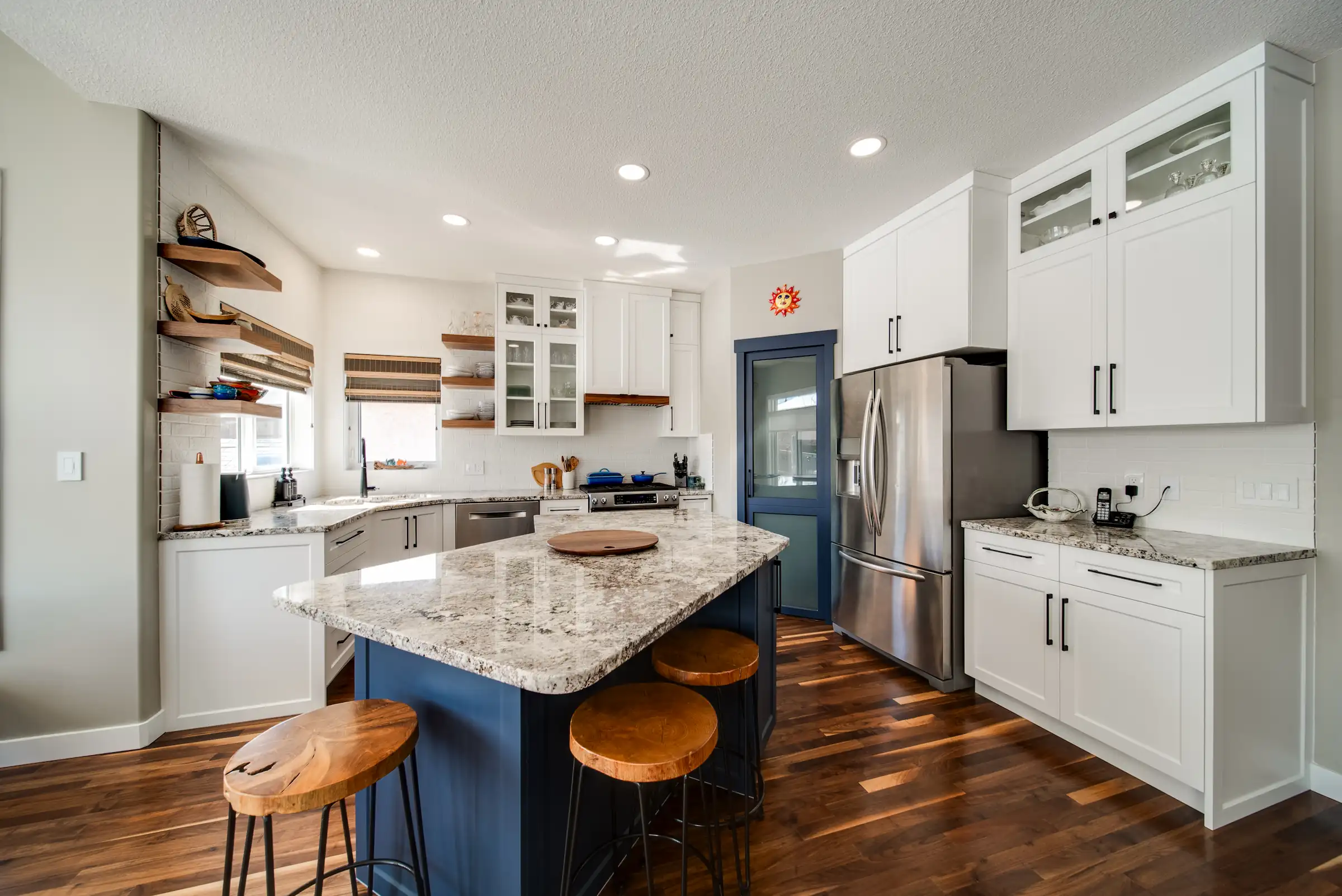 Navy blue coloured kitchen cabinets