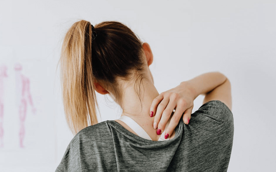 A woman has neck pain from a herniated disc and needs the best chiropractor in Hoover, AL, for treatment