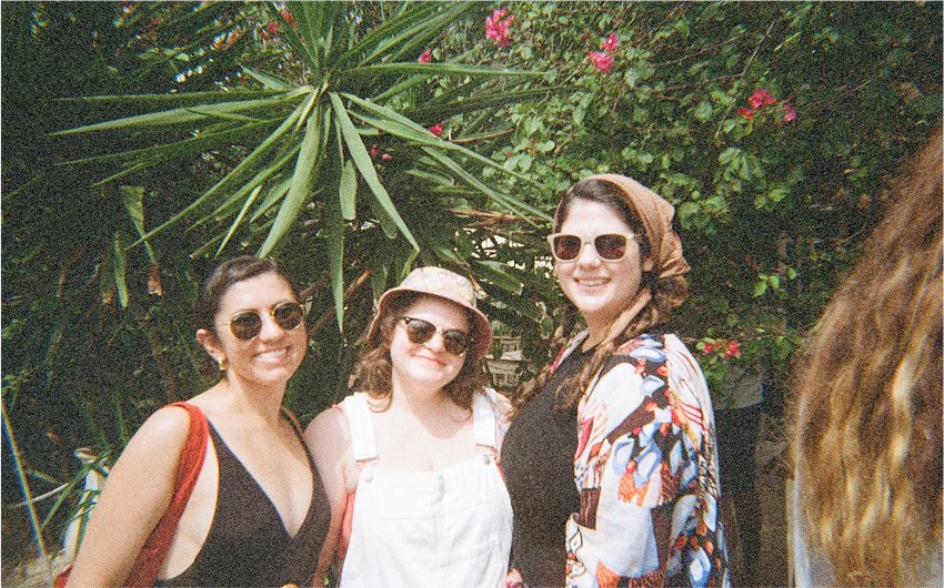 Our three founders in the jungle in Tulum smiling for the camera.