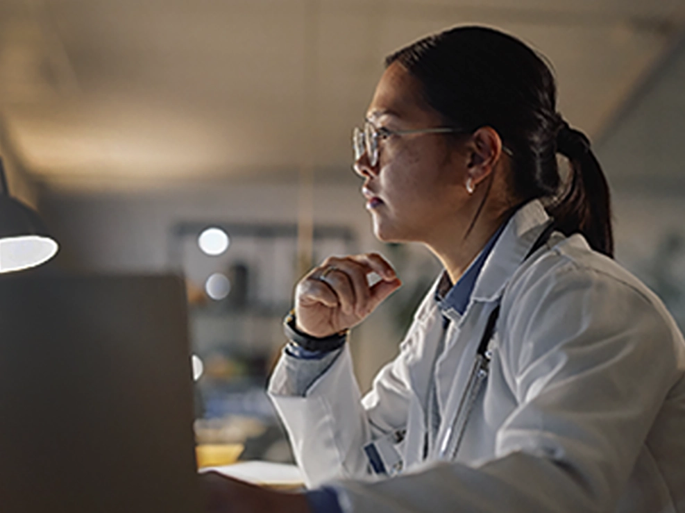 Medical practitioner processing research in lab