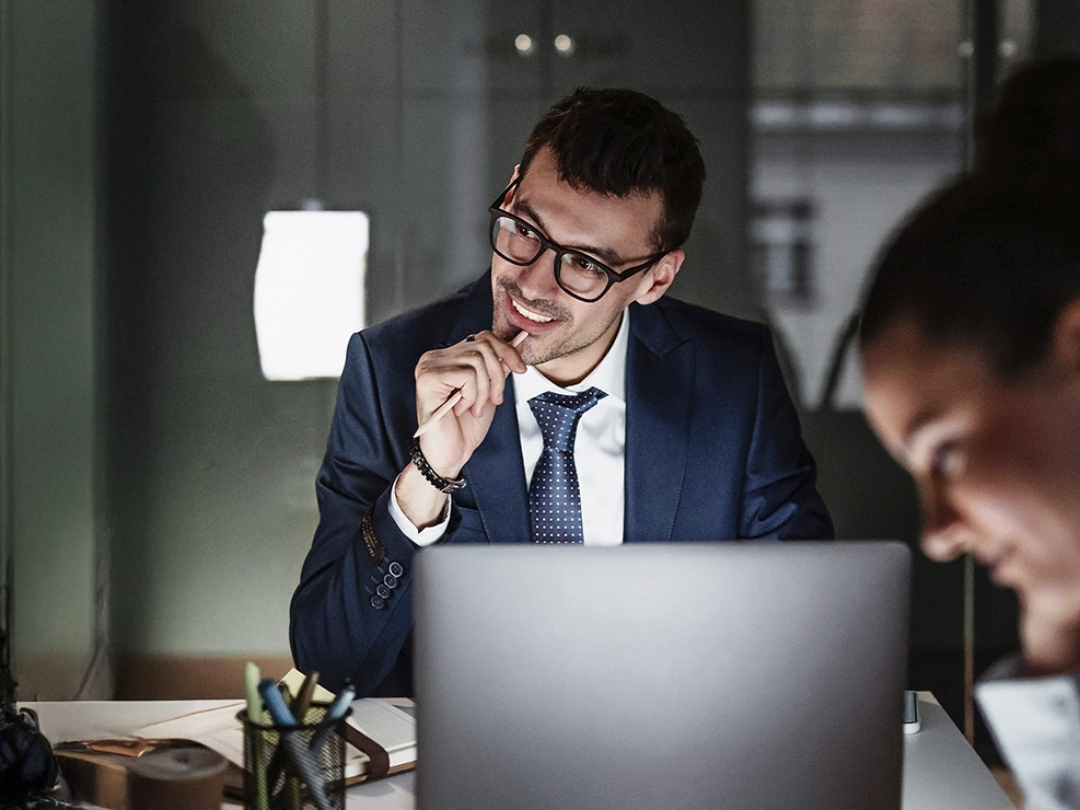 Project leader listening intently to colleague