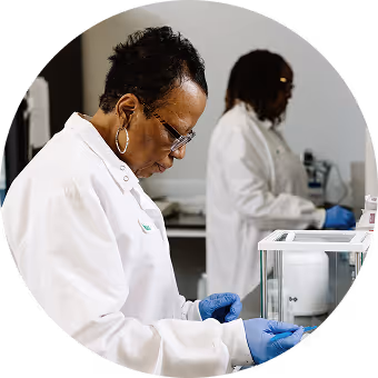 Closeup of a doctor working with plant samples