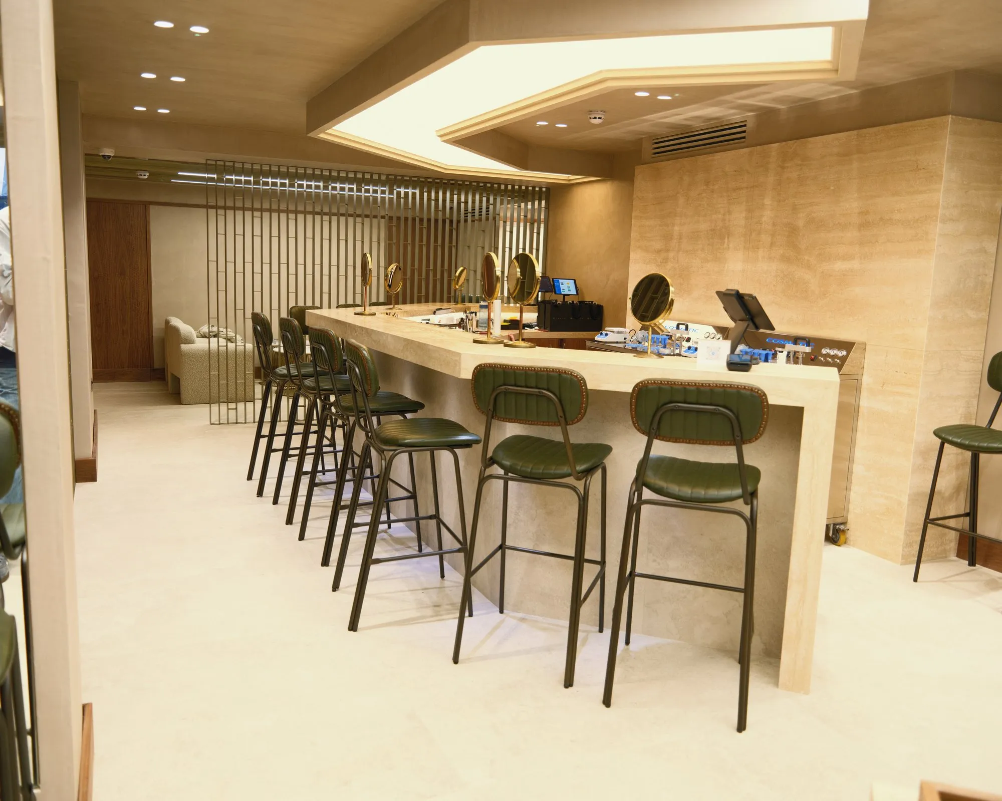 Monmouth Street beauty bar with stone counter and stools
