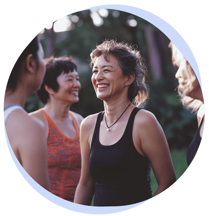 A woman outside on a walk with her friends