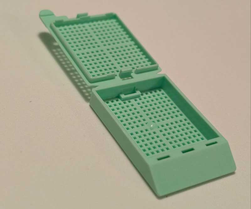 Histopathology cassette used to hold small tissue samples in formalin