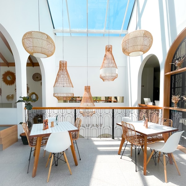 a room with a lot of chairs and tables