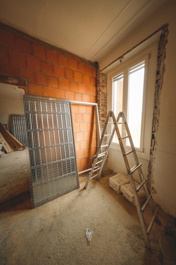 a ladder leaning against a brick wall next to a window