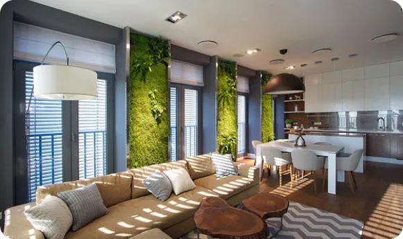 Modern living space with vertical green walls, natural light, and minimalist furnishings.