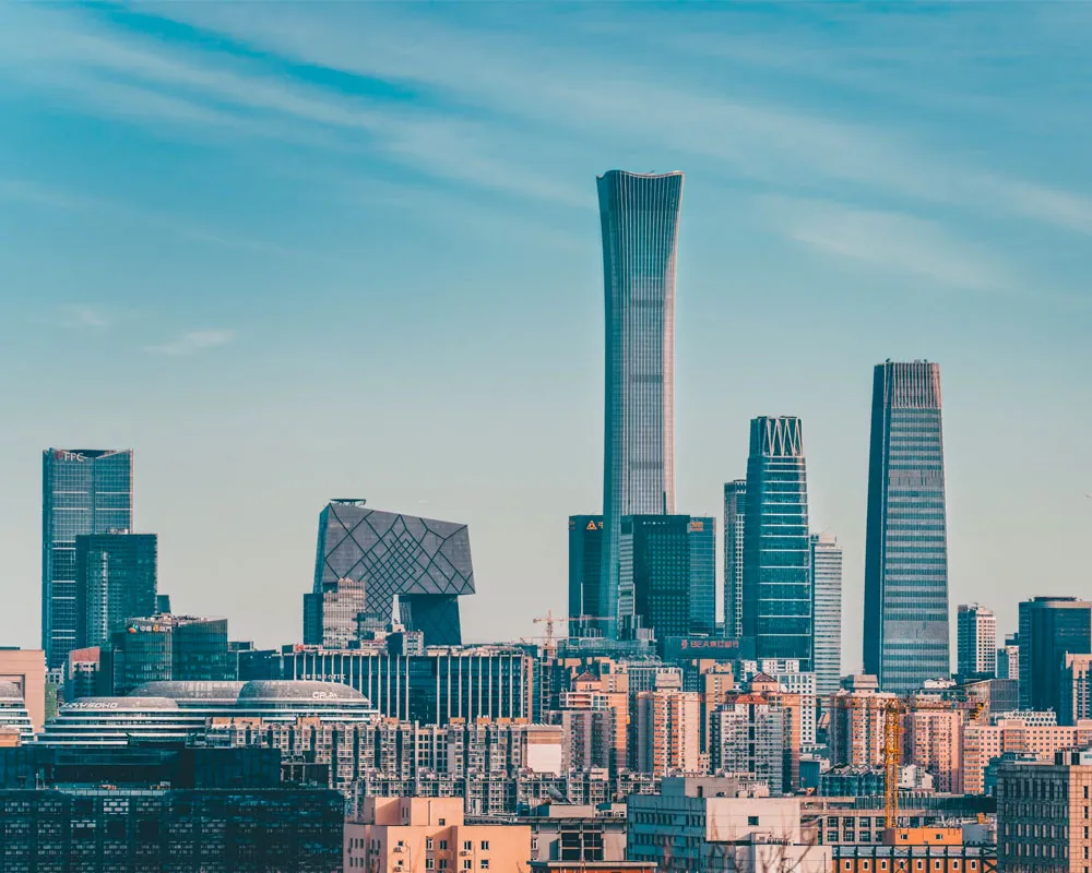 Beijing skyline featuring modern skyscrapers, including the iconic CITIC Tower.
