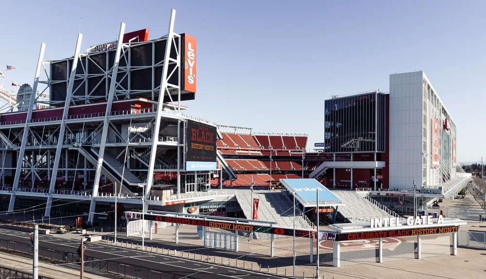 Levi's Stadium exterior with Intel Gate A, showcasing Black History Month banners and signage.