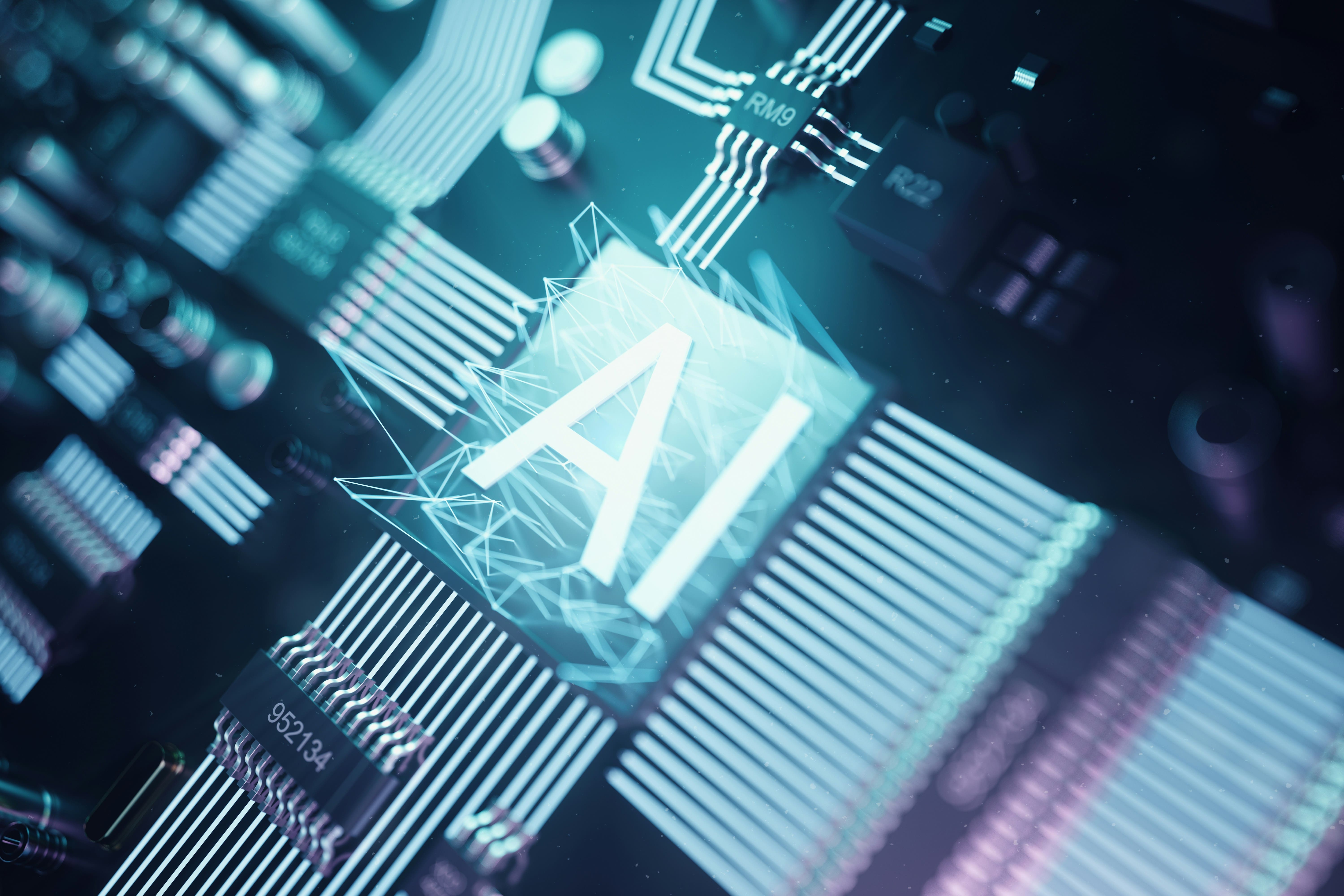 AI logo highlighted on a blue circuit board