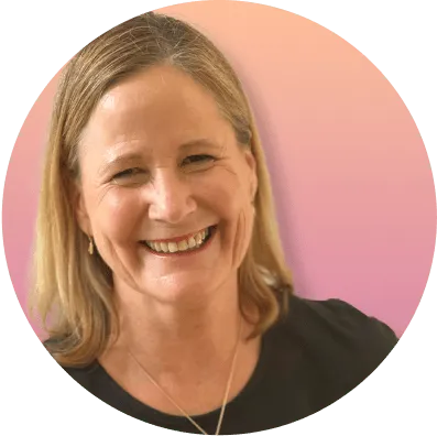 Avatar of Jude Rutherford, she wears a black shirt and is smiling towards the camera