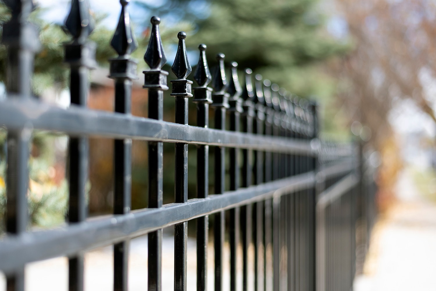 Black aluminum ornamental fence with pickets around a Columbus yard