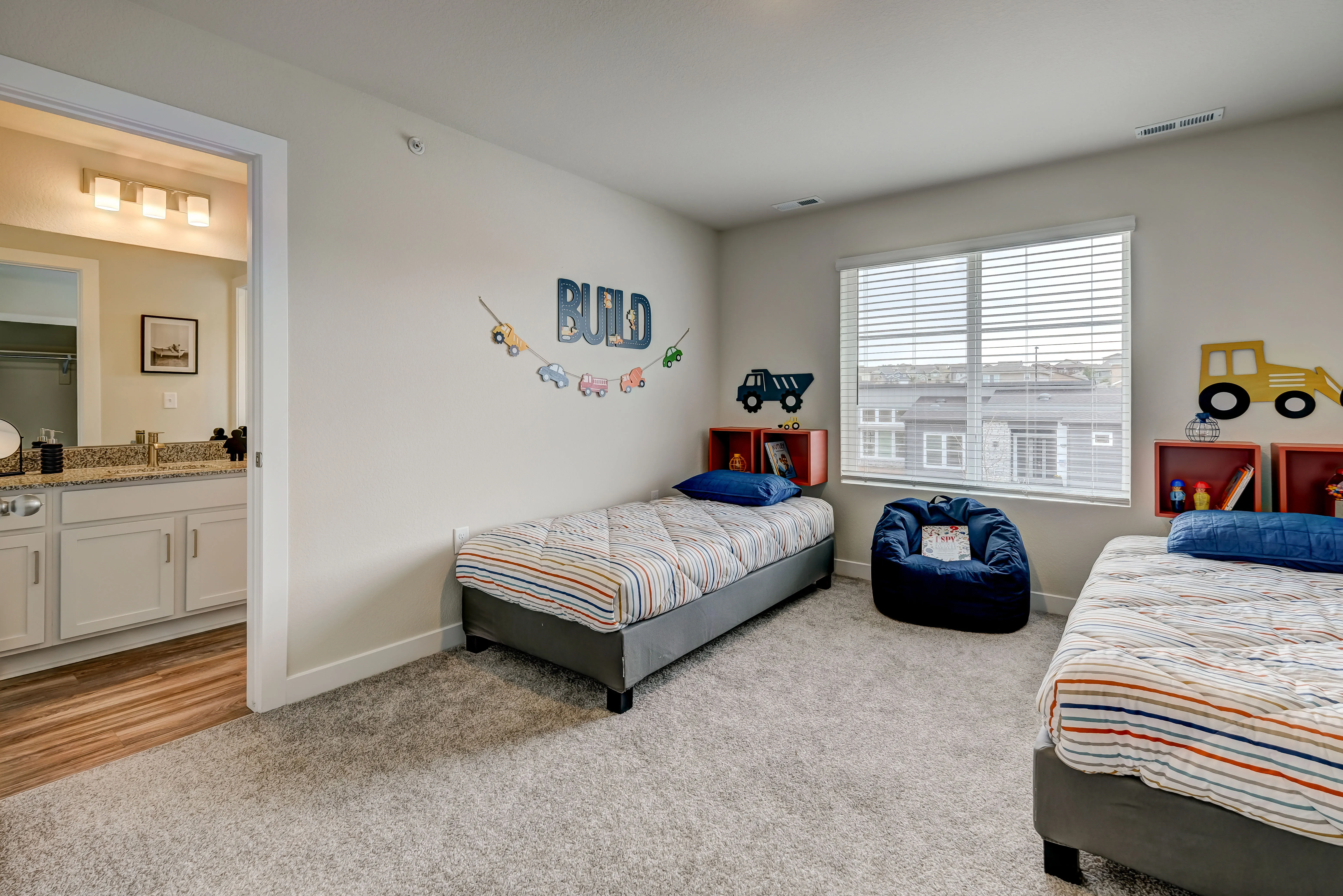 bedroom with two kids beds