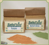 Two boxes of Safepoint turmeric powder with golden spice pile displayed below
