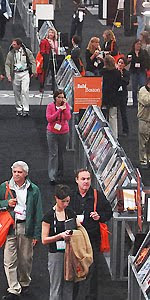 Overhead view of diverse people waiting in queue at outdoor event or venue