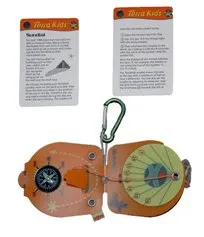 Two orange and green compass navigation devices with instruction cards and carabiner clip attached.