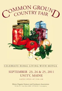 Common Ground Country Fair poster with jars, tomatoes, and vegetables promoting September 2011 event.