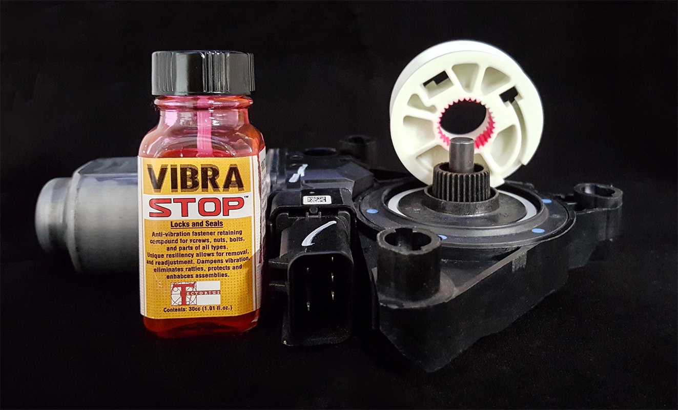 Bottle of Vibra-Stop with window regulator