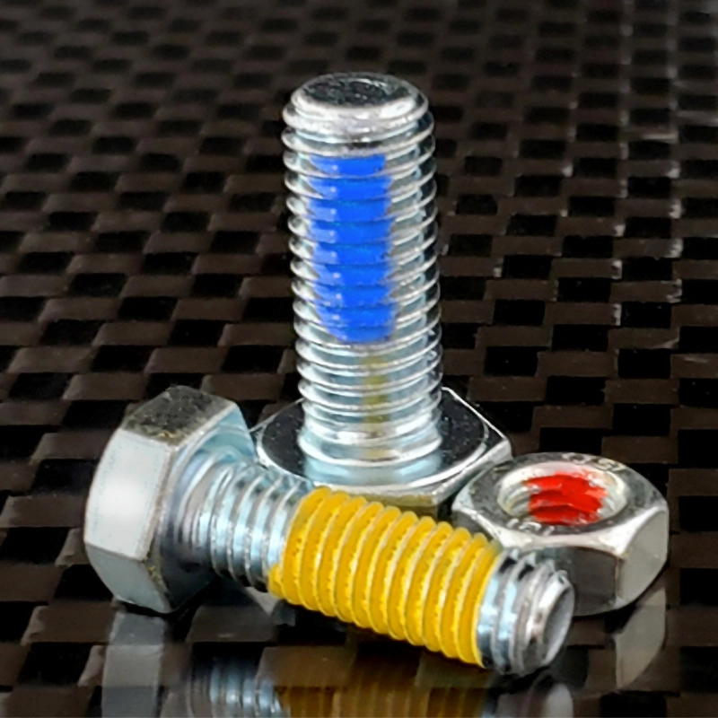 Bolts and nut coated with Tec-Lock