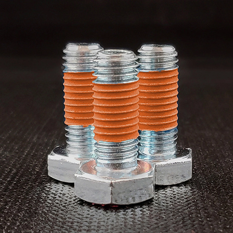 bolts coated with Tec-Bond 261 orange