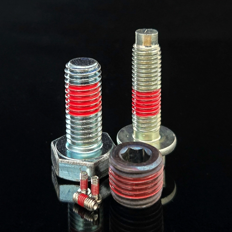 assorted parts coated with red Tec Lok
