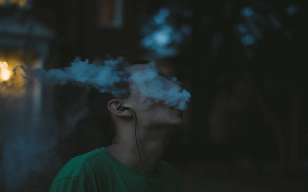 Teen in vape cloud