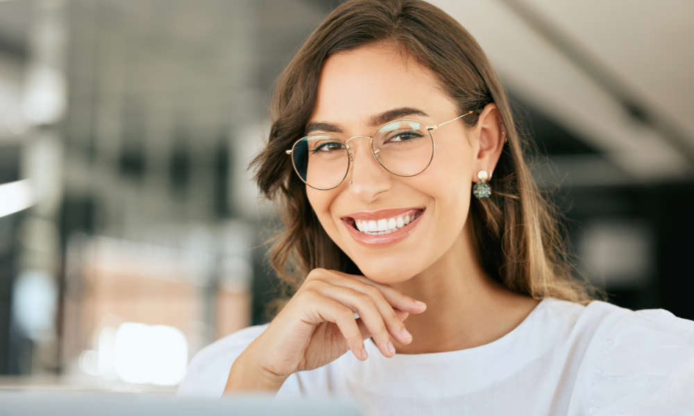 woman at work satisfied with the work of her IT work partner