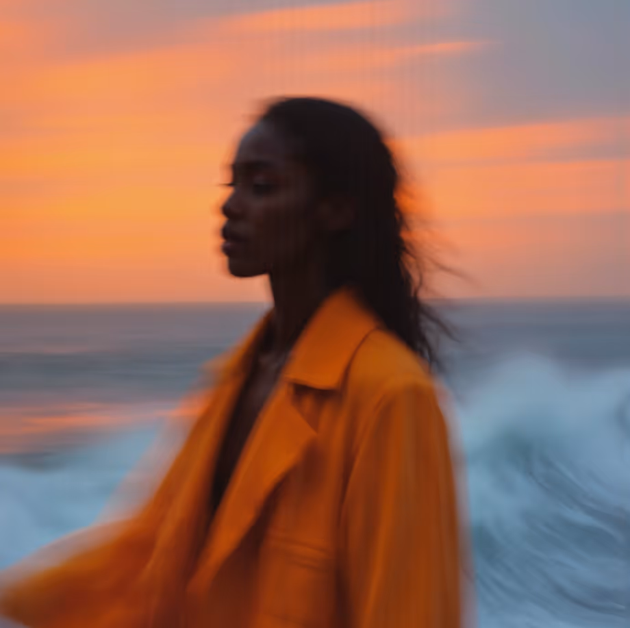 a woman looking into the ocean