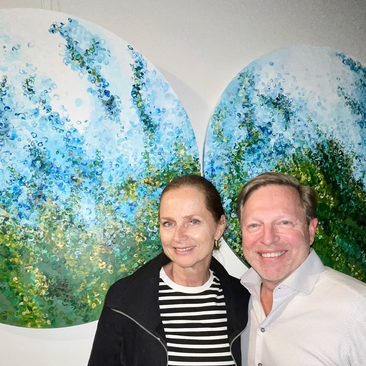 Global Citizen round paintings commission by Naomi Simson