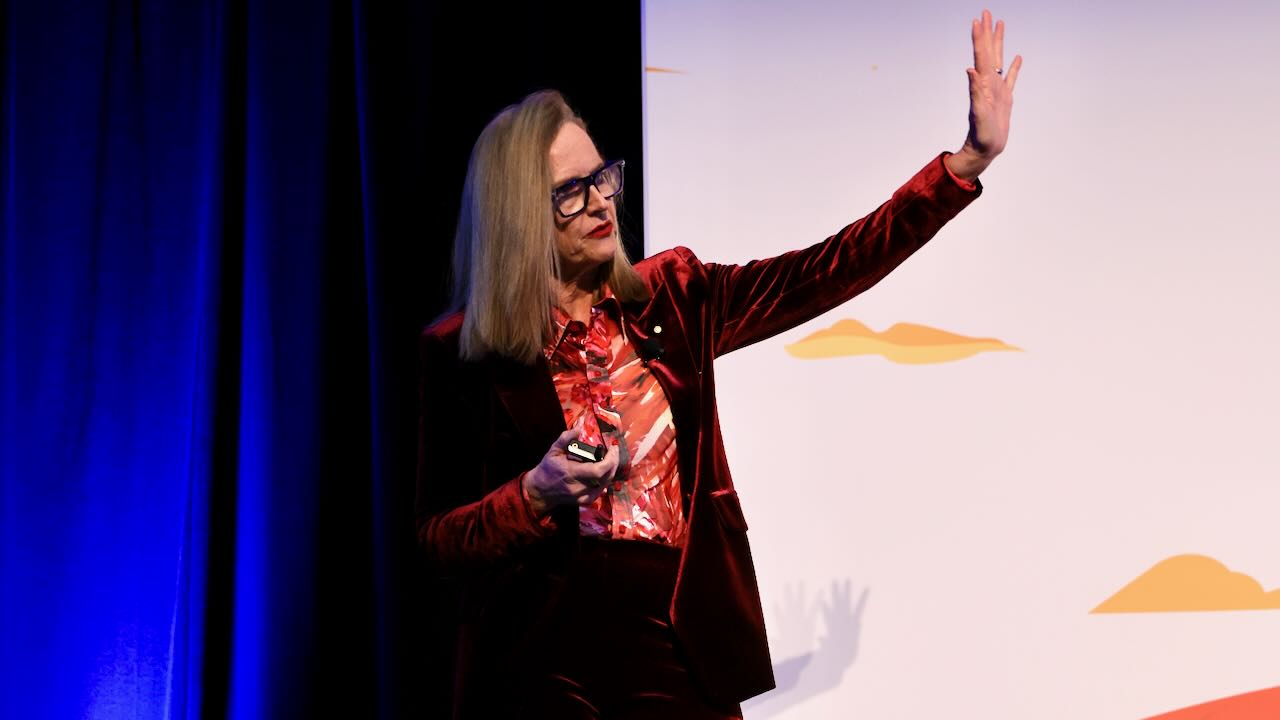 Naomi Simson on stage as keynote speaker at business event, Sydney, 2026