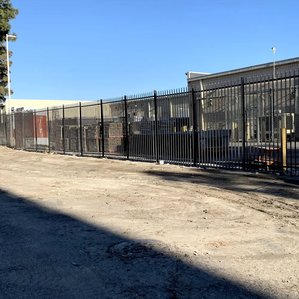 A nice fence on a well grounds.