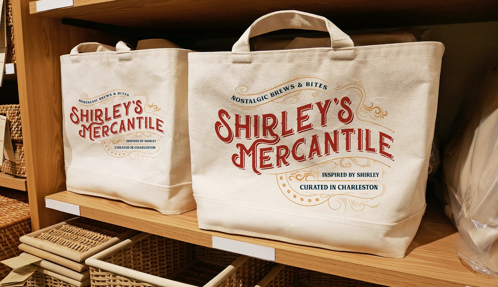 Custom-branded canvas tote bag displayed on rustic shelves at Shirley’s Mercantile, a locally inspired country market