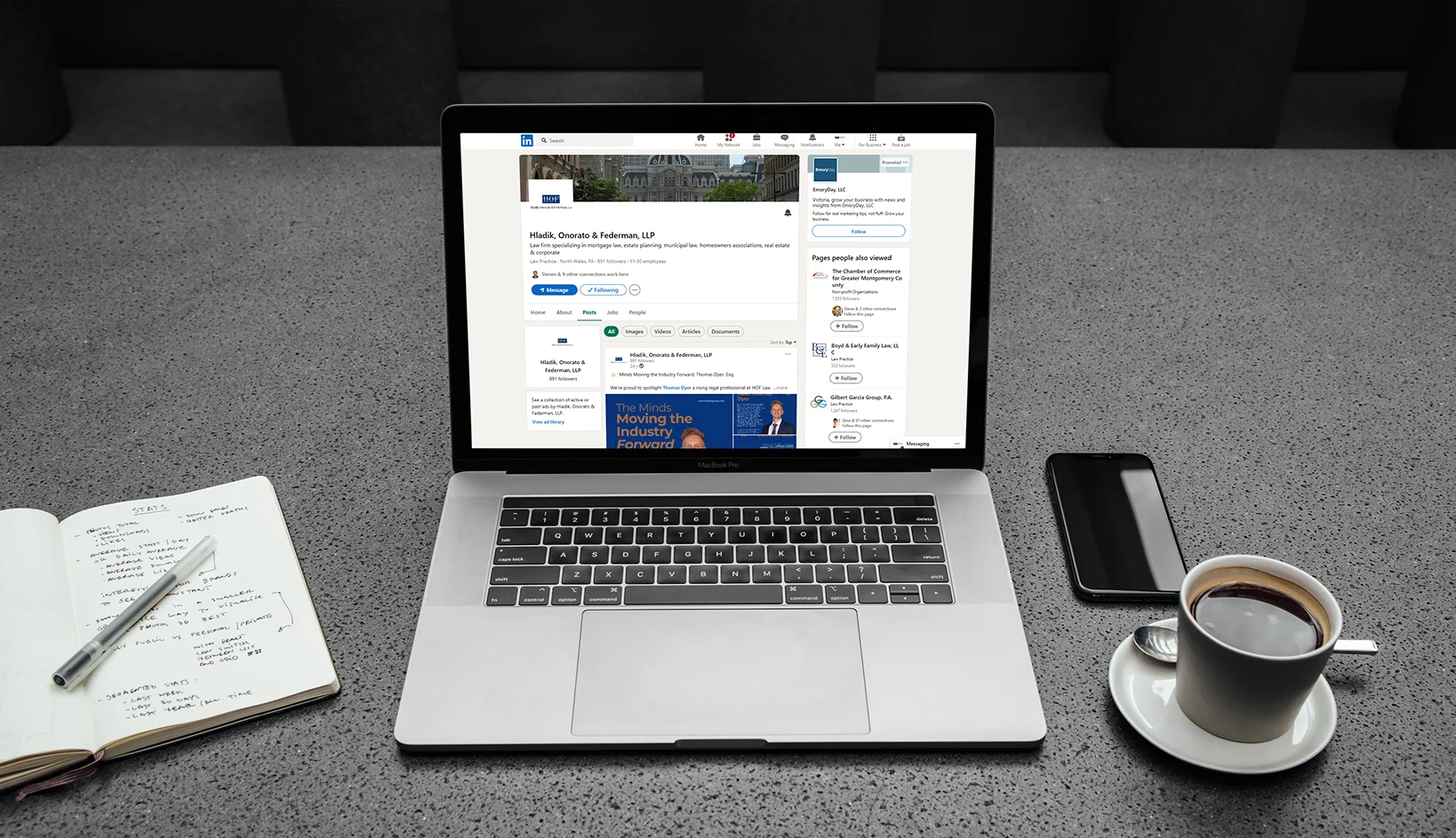 Laptop display of HOF Law Group’s LinkedIn profile and branded content suite created by Draper Designs