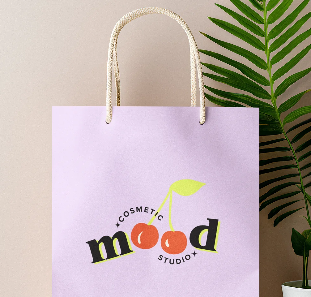 Lavender shopping bag with Mood Cosmetic Studio logo for elevated cosmetic studio client packaging