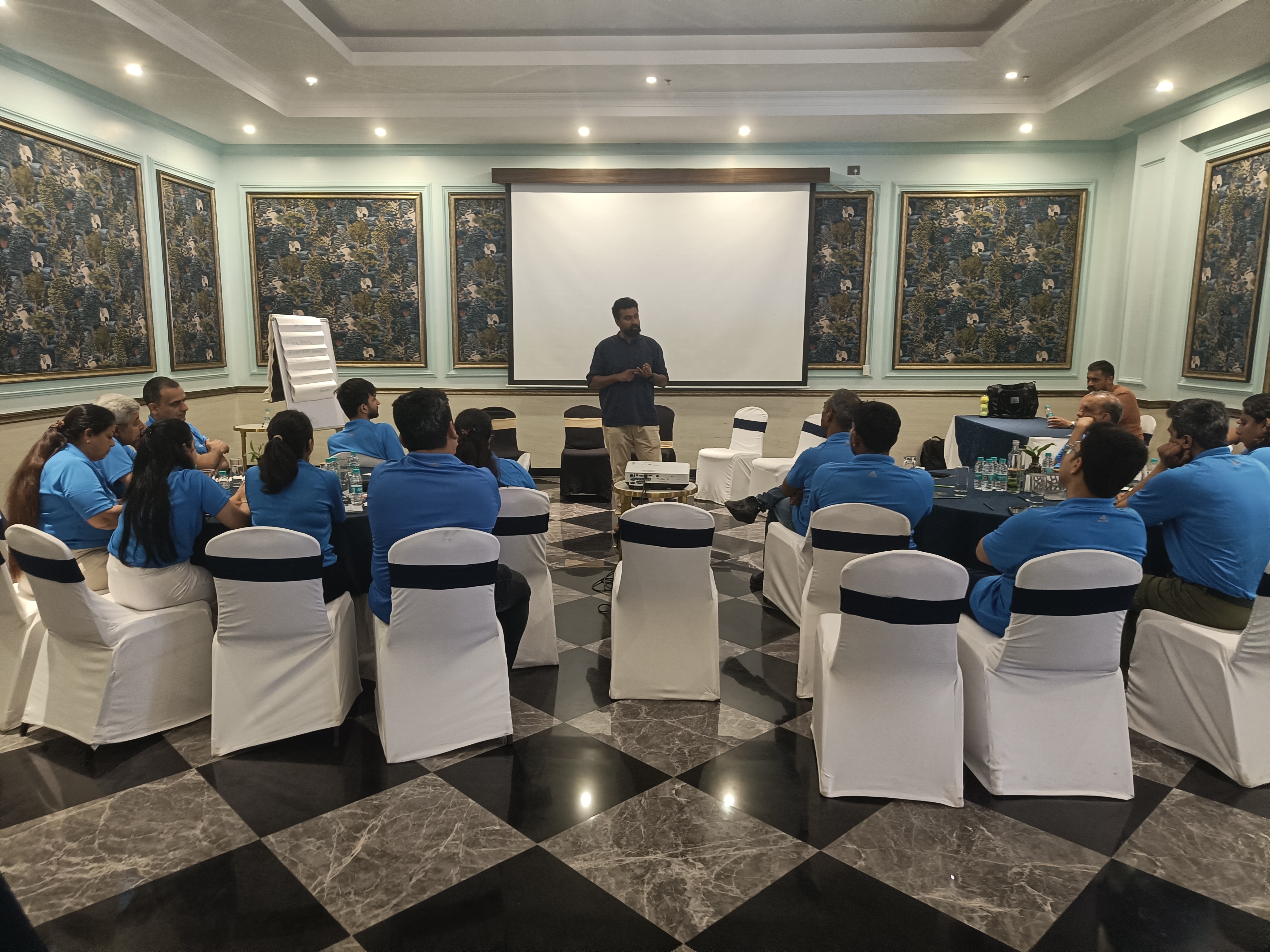 Digiyatra team seated in a corporate learning circle