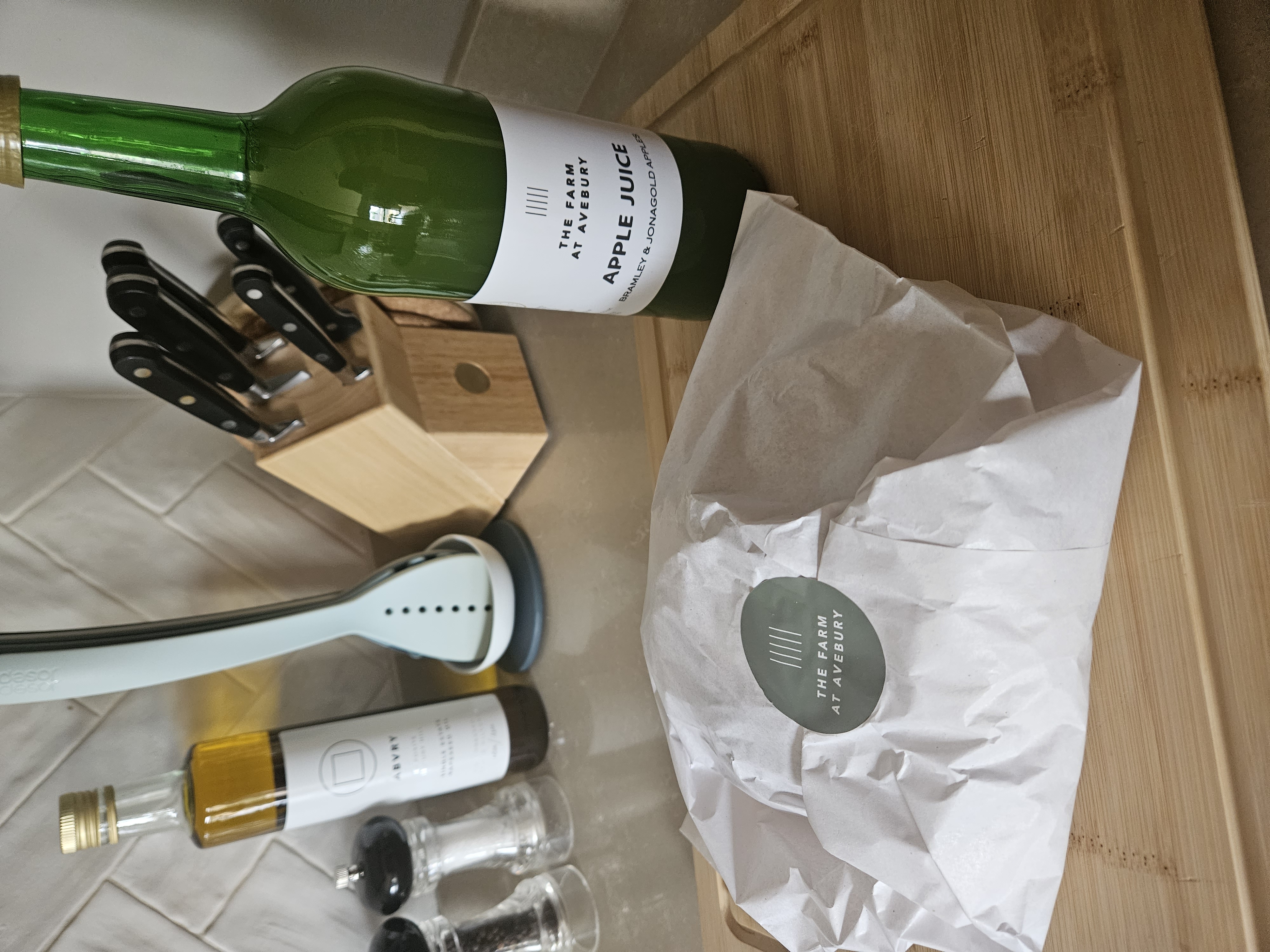 Welcome package at the Farm at Avebury with fresh sourdough bread and apple juice