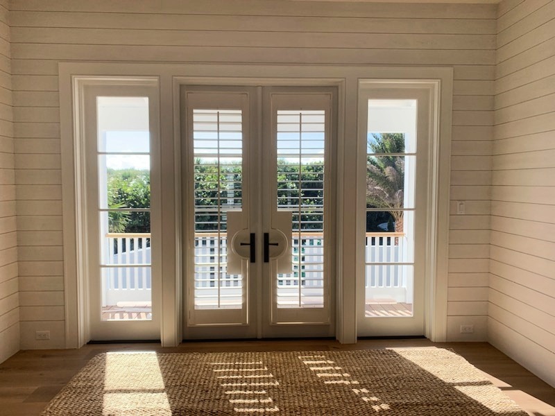 Sample custom wood shutters on french doors