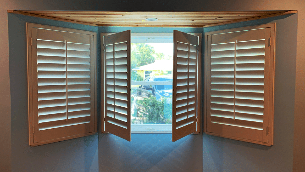 Sample of specialty shape custom wood shutters